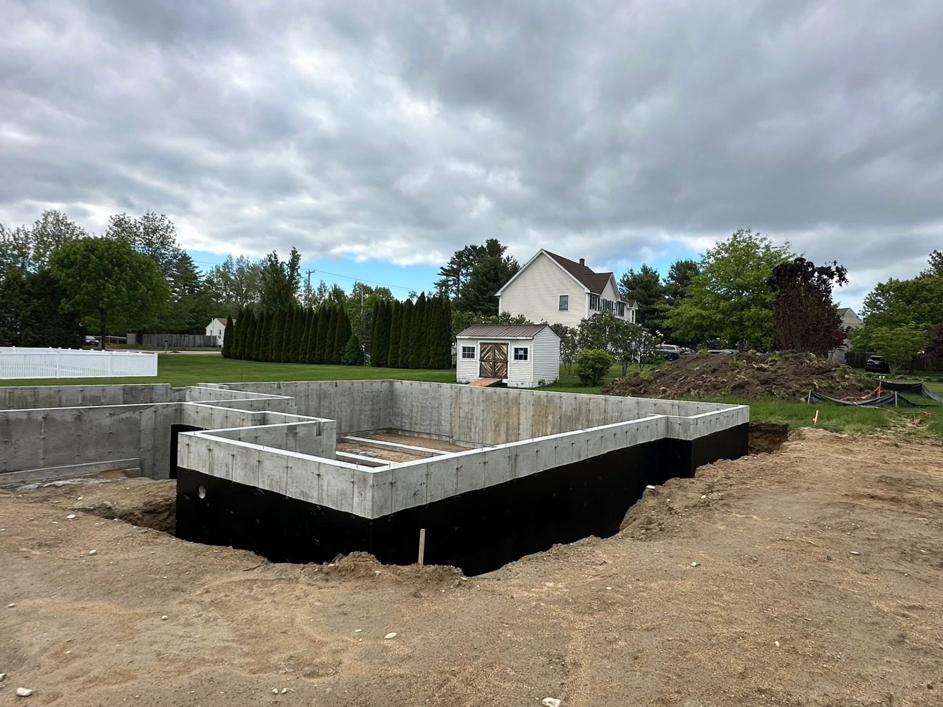 Large residential foundation footprint sealed and ready for backfill