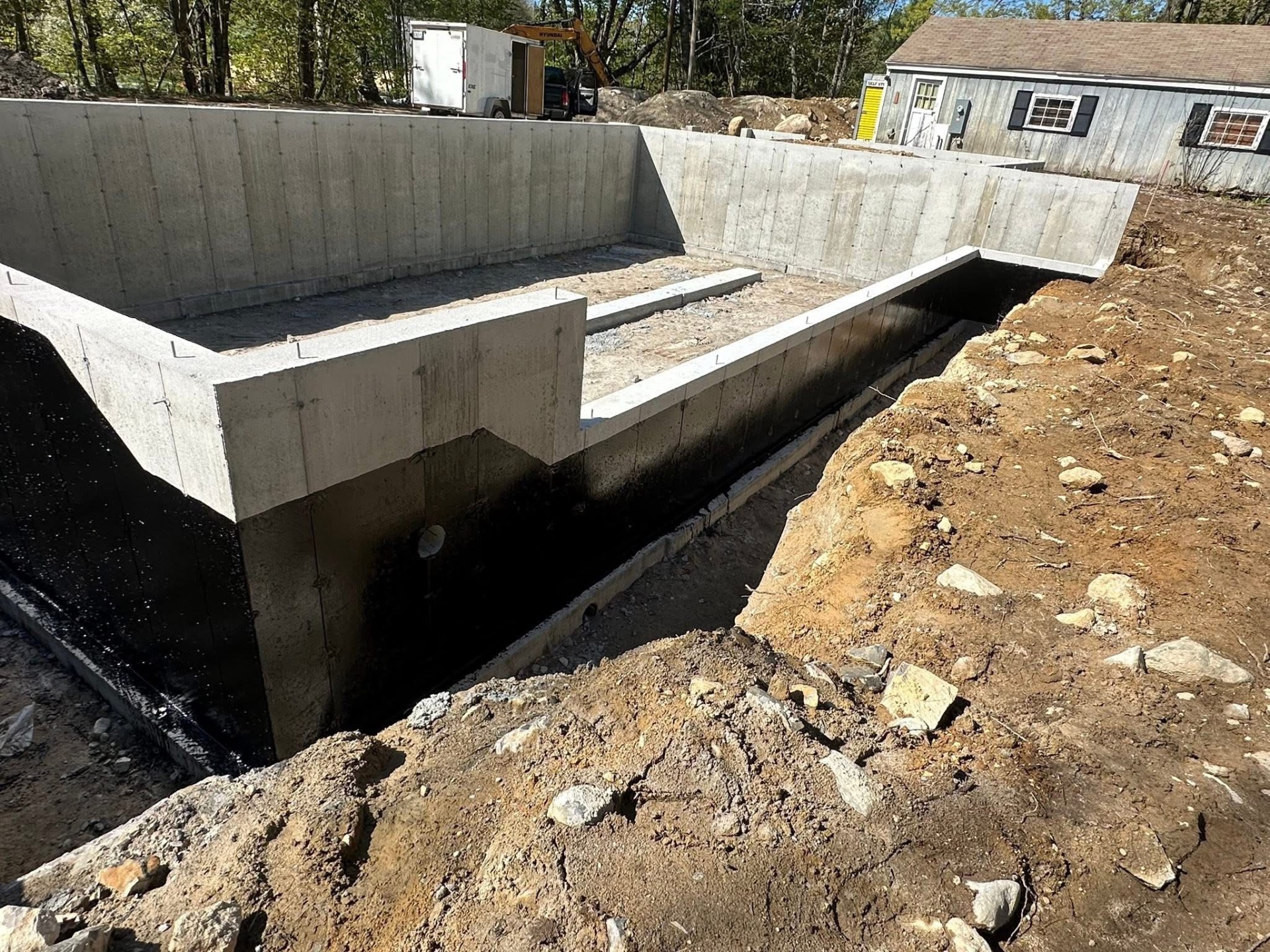 Deep foundation excavation with fully sealed poured concrete walls